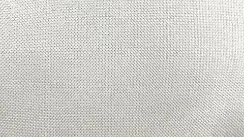 Crisp white linen texture macro detail of woven fibers serving as organic neu Stock Photos