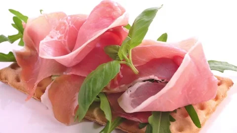 Crispbread with Ham Slices isolated on white Background Stock Footage 189329882