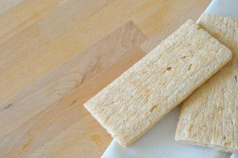Crispbread on a kitchen table, large copy space Stock Photos