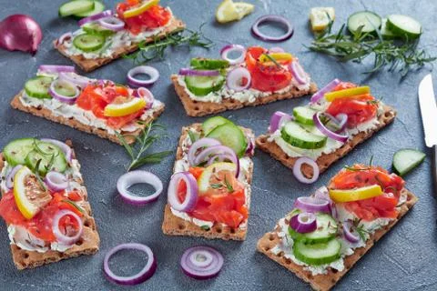 Crispbread red fish open toasts with cheese Stock Photos
