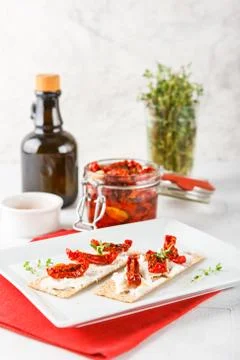Crispbread with sun-dried tomatoes Stock Photos
