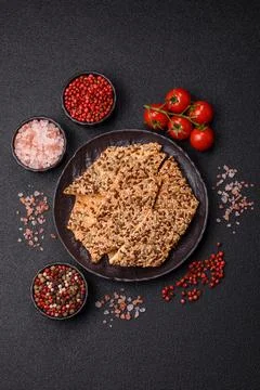 Crispbread, thin bread with seeds and grains, a baked cracker. Crispbread w.. Stock Photos