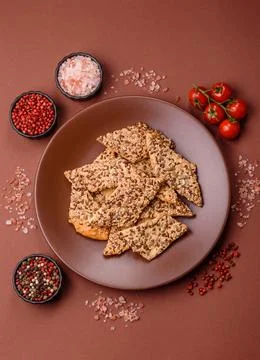 Crispbread, thin bread with seeds and grains, a baked cracker. Crispbread w.. Stock Photos
