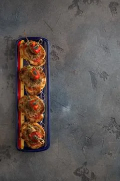 Crispbread with tuna top view, dark photo Stock Photos