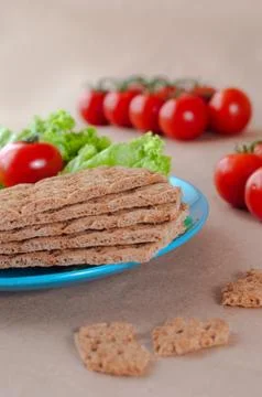 Crispbreads with cherry tomato Stock Photos