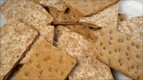 Crispbreads on a wooden board Stock Footage 142000542