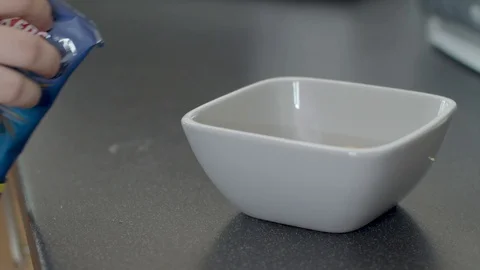 Crisps in Bowl Stock Footage 115254430