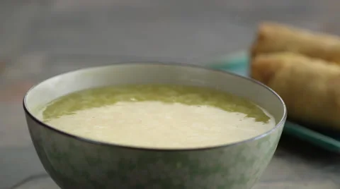 Crisps falling in soup Video stock 46668731