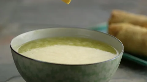 Crisps falling in soup Stock Footage 46668760