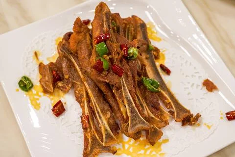 A crispy and delicious Guangxi dish, pork fan bone with salt and pepper Stock-Fotos