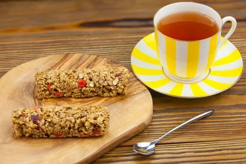 Crispy appetizing bread with strawberries on a plate on  wooden background Stock Photos