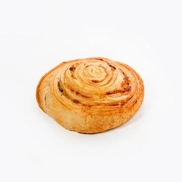Crispy appetizing snail-bun made of puff pastry, close-up. White background Stock Photos