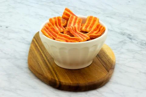 Crispy bacon flavored snack. Фото