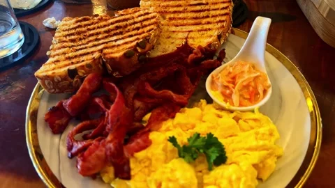 Crispy Bacon Scrambled Eggs and Grilled Toast Hotel Breakfast in Philippines 動画素材 333760906