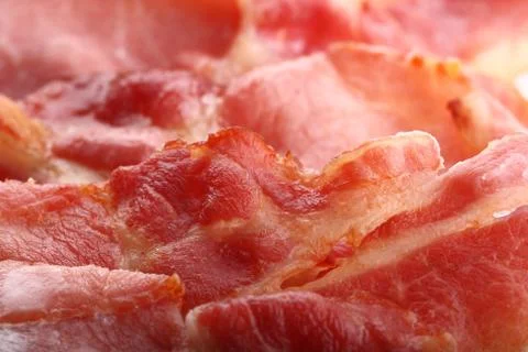 Crispy bacon slices super macro shot   perfect for backgrounds Stock Photos