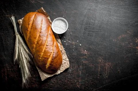 Crispy bread with spikelets and salt. Stock Photos