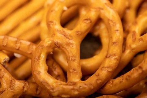 Crispy bread straws with salt, close-up, selective focus, top view. Stock Photos