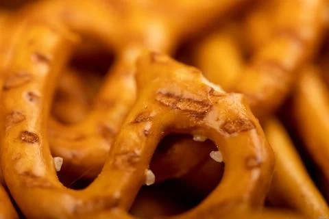 Crispy bread straws with salt, close-up, selective focus, top view. Stock Photos