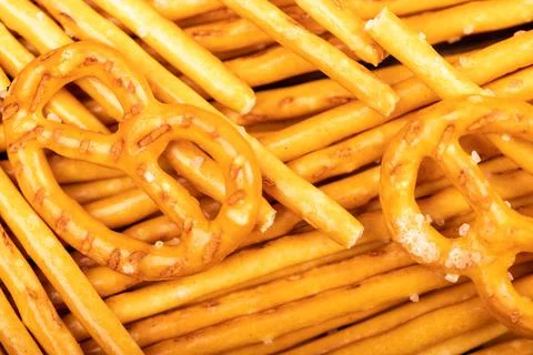 Crispy bread straws with salt, close-up, selective focus, top view. Stock Photos