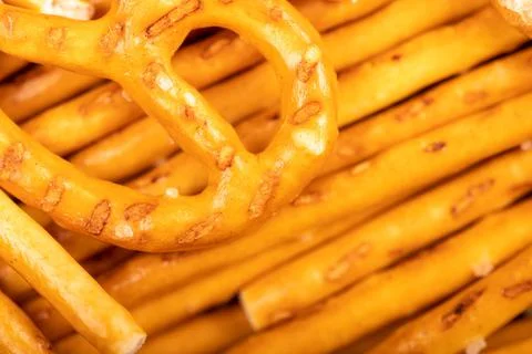 Crispy bread straws with salt, close-up, selective focus, top view. Stock Photos