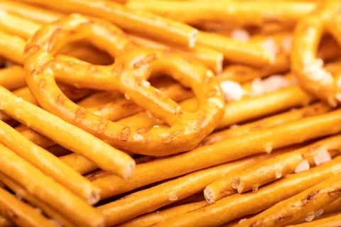 Crispy bread straws with salt, close-up, selective focus, top view. Stock Photos