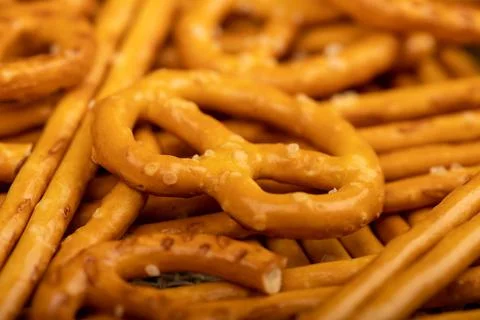 Crispy bread straws with salt, close-up, selective focus, top view. Stock Photos