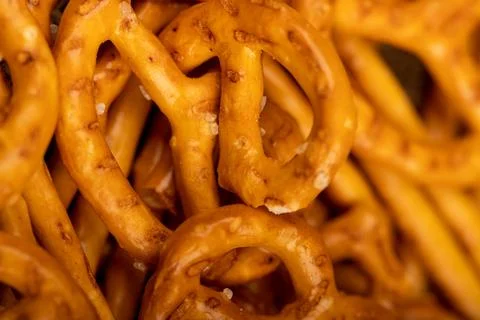 Crispy bread straws with salt, close-up, selective focus, top view. Stock Photos