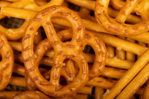 Crispy bread straws with salt, close-up, selective focus, top view. Stock Photos