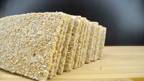 The crispy bread on top of the table Stock Footage 135694309