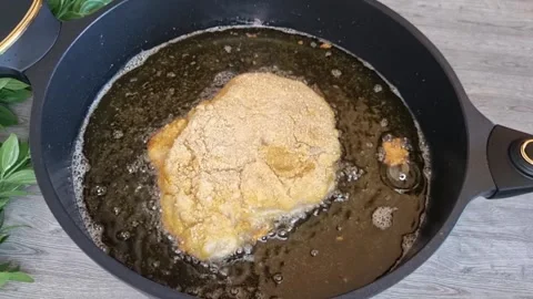 Crispy Breaded Chicken Breast Frying in Hot Oil Stock Footage 344645432