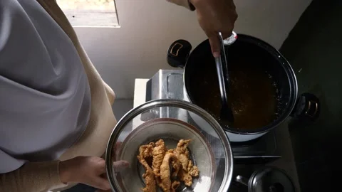 Crispy breaded fried chicken, hot from the fry, ready to serve Stock Footage 280733455