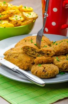 Crispy breaded mushroom schnitzel Stock Photos