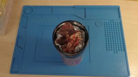 Crispy candy in an iron jar Stock Footage 168539016