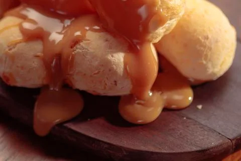 Crispy cheese bread stuffed with dulce de leche. Stock Photos
