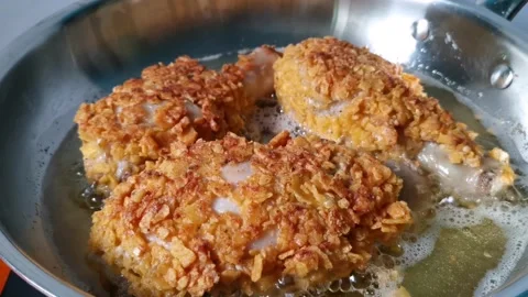 Crispy Chicken Legs in a Pan Stock Footage 161006090