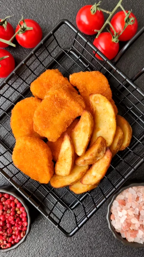 Crispy chicken nuggets, meat takeaway meal with salt. Chicken nuggets, fast food Video stock 314775570
