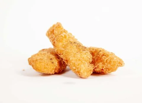 Crispy chicken strips over a plain background Stock Photos