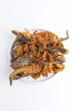 Crispy deep fried catfish with savory crunchy topping on white plate isolat.. Stock Photos