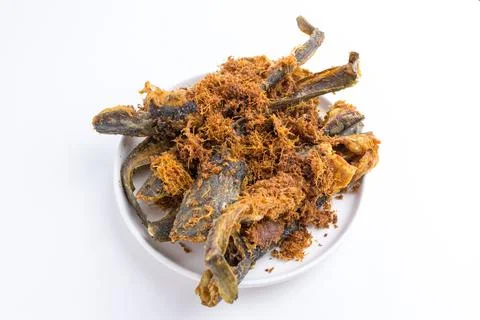 Crispy deep fried catfish with savory crunchy topping on white plate isolat.. Stock Photos