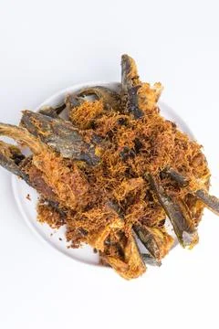 Crispy deep fried catfish with savory crunchy topping on white plate isolat.. Stock Photos