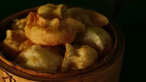 Crispy deep fried dumplings stuffed with meat or vegetables. Stock Footage 233007780