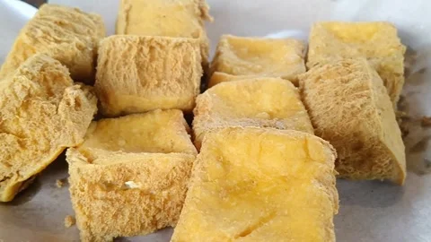 Crispy Deep Fried Tofu Snack Cooking In Hot Frying Oil Stock Footage 339377386