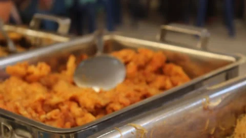 Crispy flour fried shredded chicken dish served on a container Stock Footage 241286155