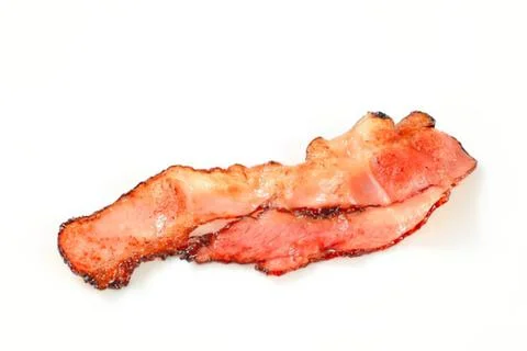 Crispy fried bacon with brown edges Stock Photos