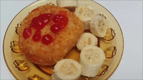 Crispy Fried Bread with Tomato Sauce and Banana Slices Stock Footage 336472757