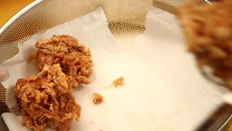 Crispy fried chicken pieces with appetizing golden color Stock Footage 325617950
