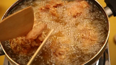 Crispy fried chicken pieces with appetizing golden color Stock Footage 325618213