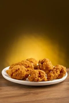 Crispy fried chicken on the plate. Stock Photos