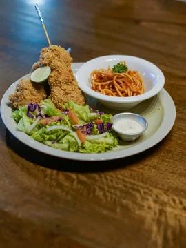 Crispy Fried Chicken with Spaghetti and Salad Plate Stock Photos