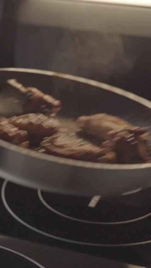 Crispy Fried Chicken Wings in Pan – Cinematic Close Up Stock Footage 343303821